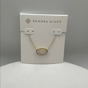 1211. Kendra Scott Gold Necklace with White Stone Pendant. 14”-16”.